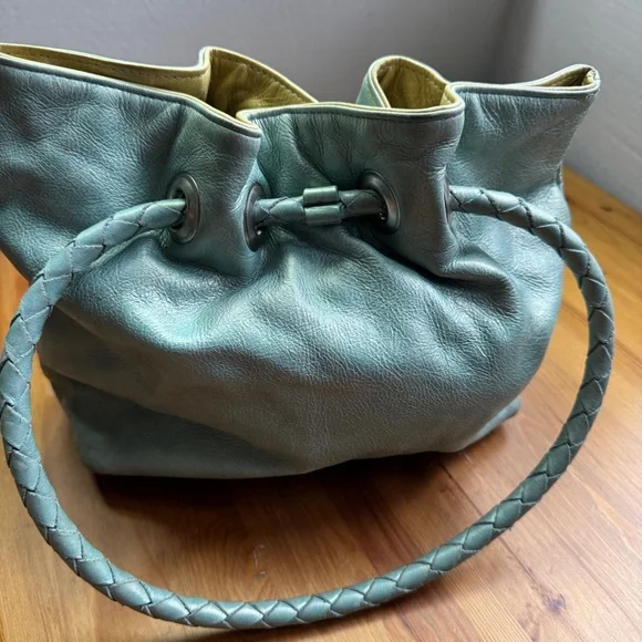 Susan Farber Collections turquoise bag with signature leather vintage